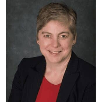 Professional headshot of a woman in business attire