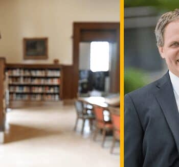 Library interior and professional man in suit