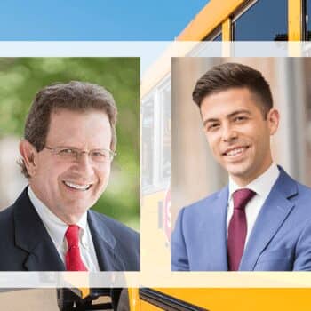 Two professional men with school bus, outdoor background