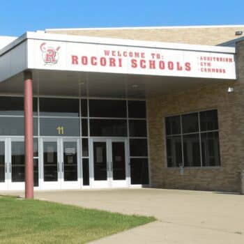 Rocori school entrance with welcoming sign and glass doors