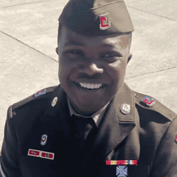 Happy military officer in uniform smiling outdoors