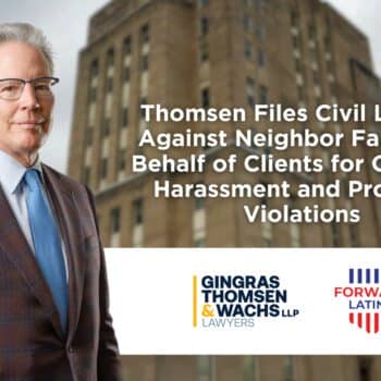 Lawyer outdoors with courthouse background and firm logo