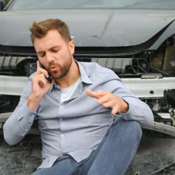 Man calling for help after car accident