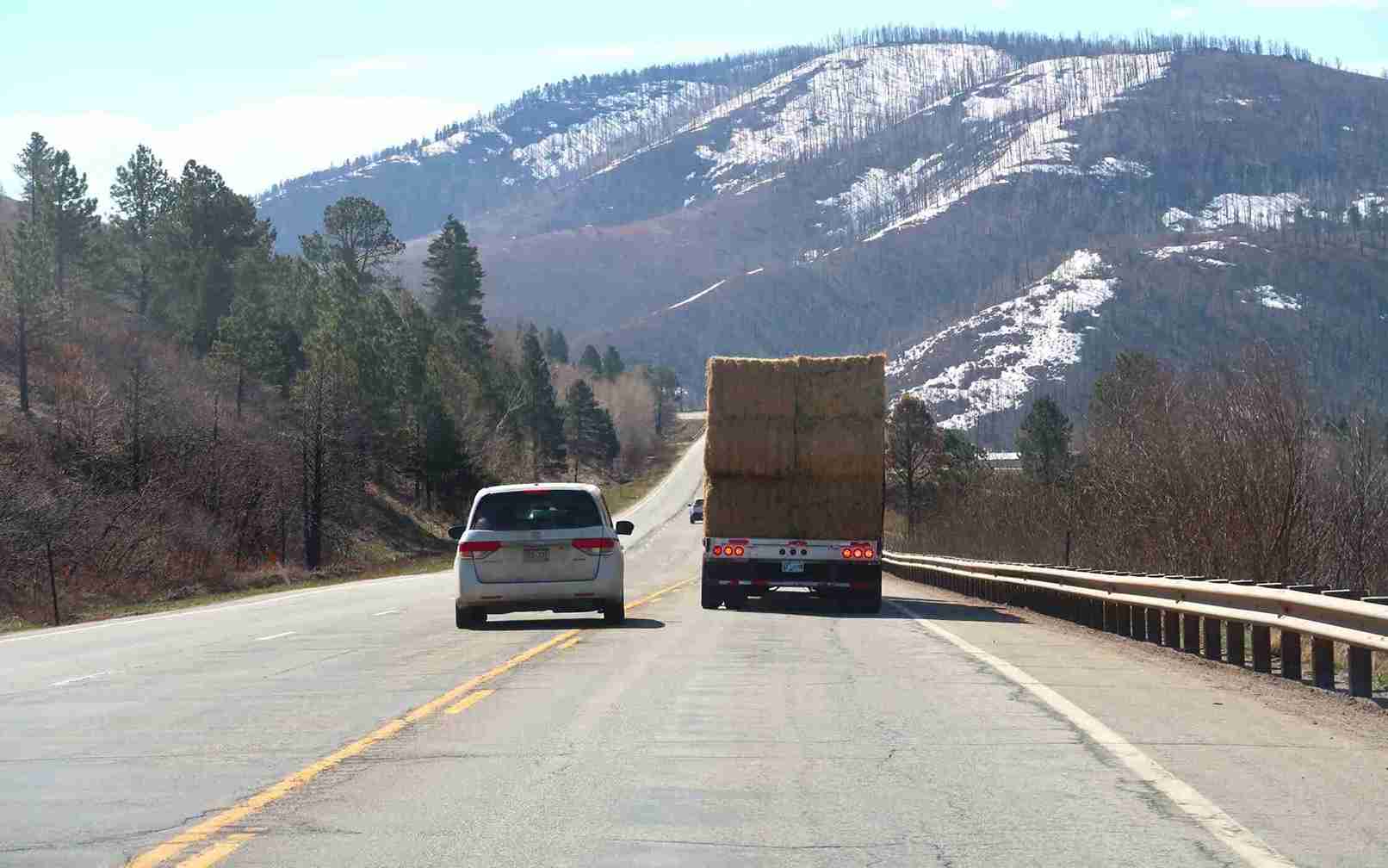 Small car passing a semi truck Small car passing a semi truck