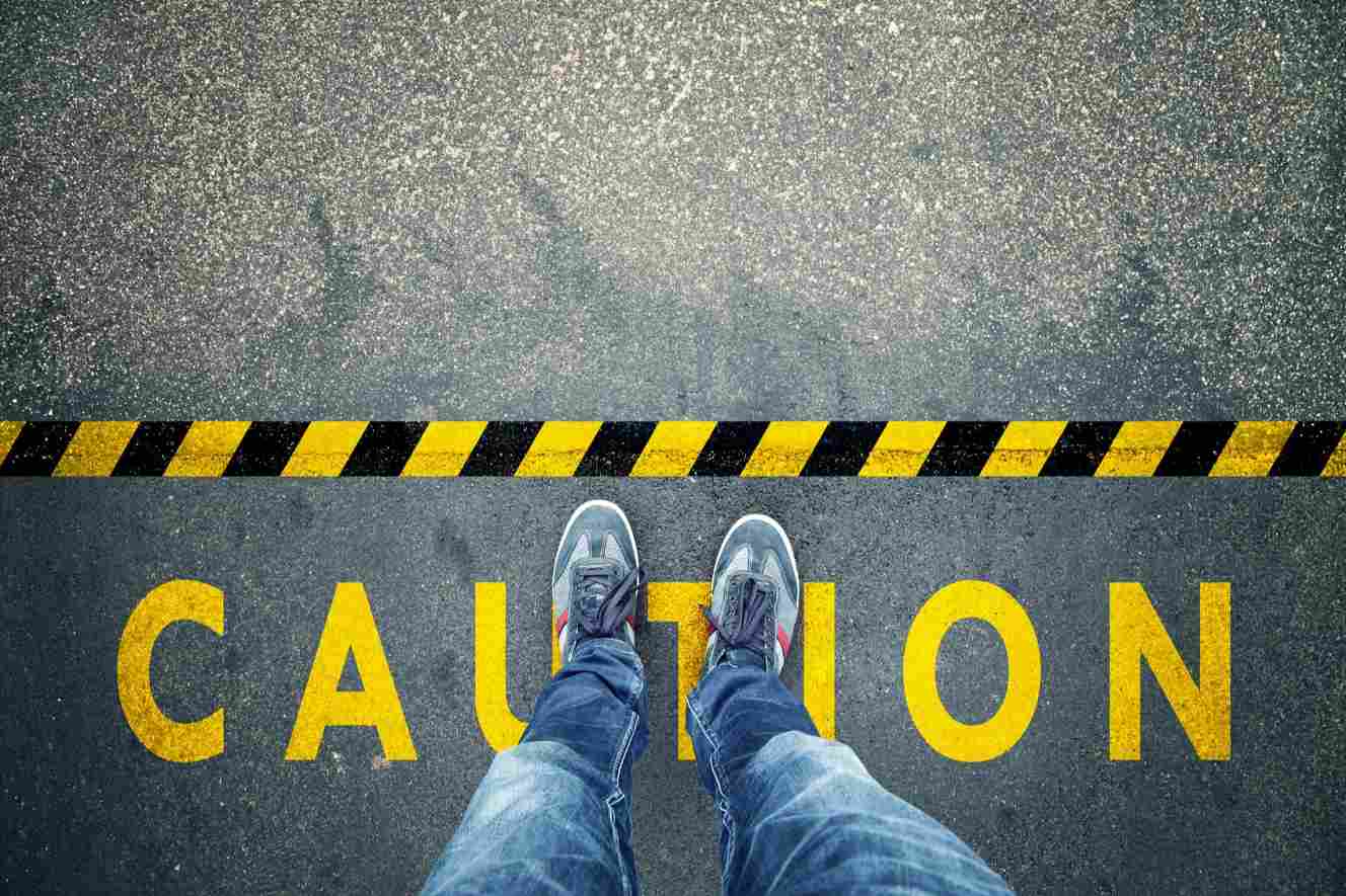 Photo of Caution sign and caution line